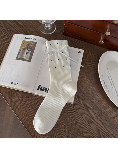 Rufia crew socks folded to show soft fabric and ribbed design
