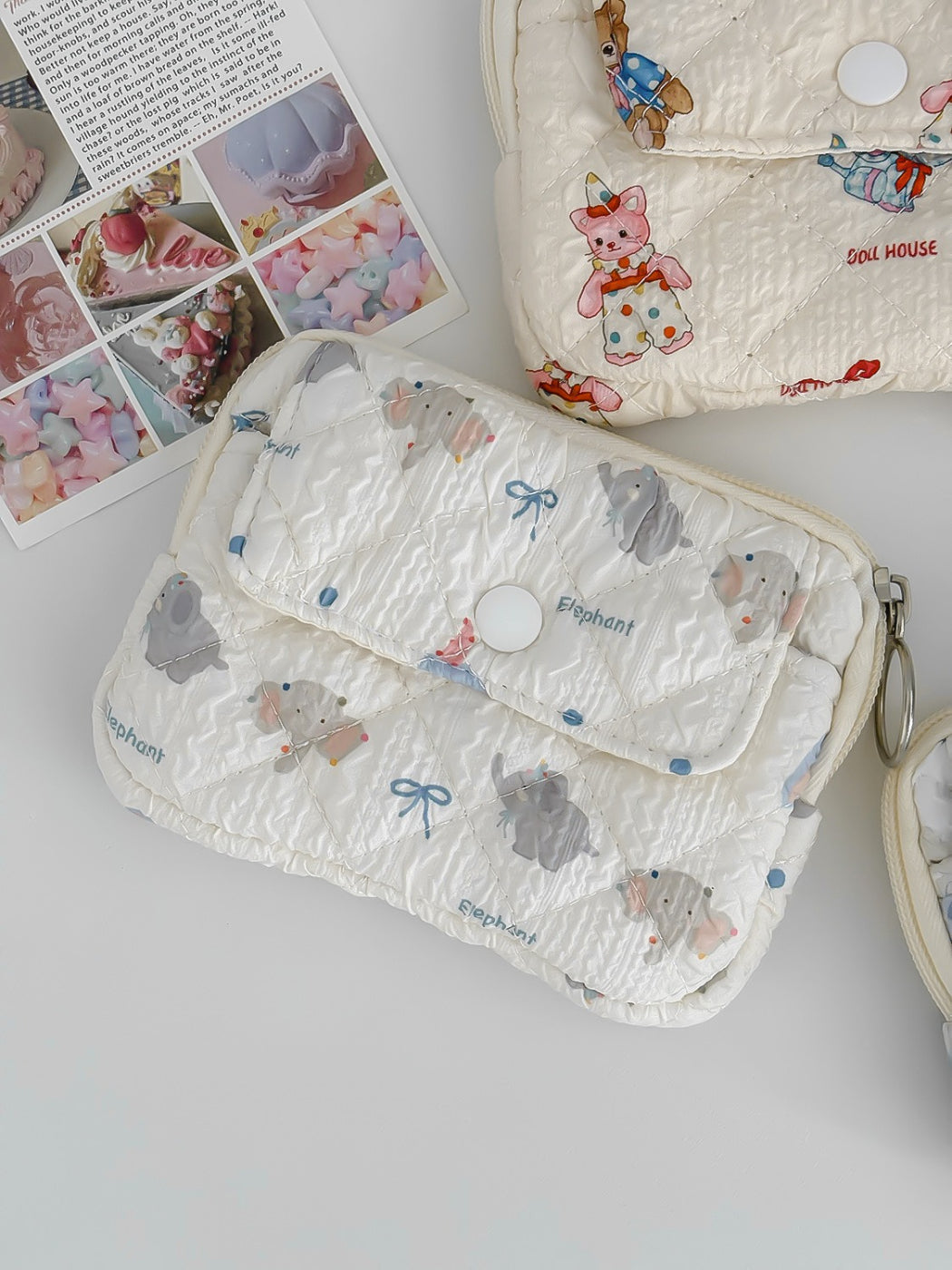 Cosbai soft quilted travel pouch displayed flat with cartoon characters visible