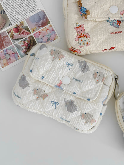 Cosbai soft quilted travel pouch displayed flat with cartoon characters visible