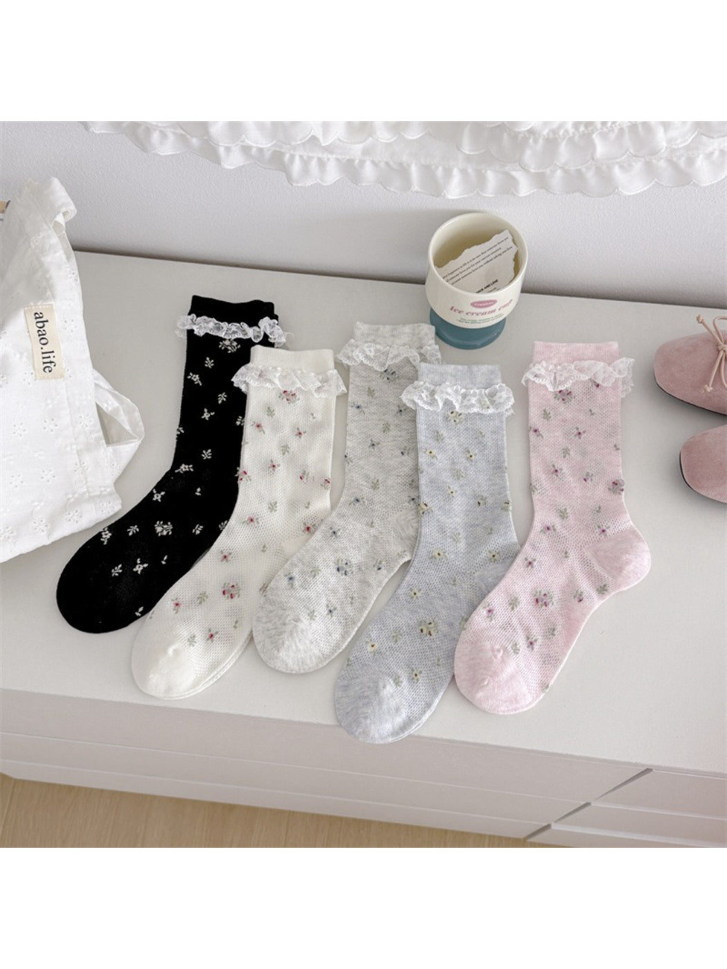 Rufia Romantic Lace Cuff Crew Socks displayed flat highlighting lace cuff and soft fabric