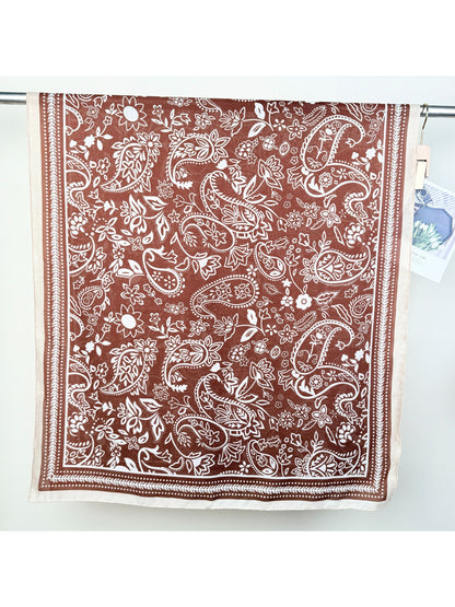 Scarvii Western Paisley Wrap Scarf laid flat showing full paisley pattern and fringed edges