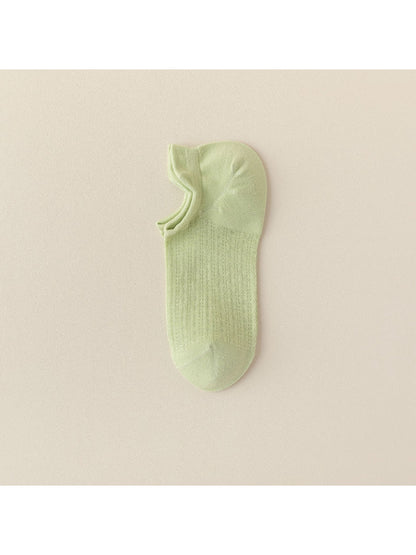 Black liner sock worn with black shoe, highlighting invisibility
