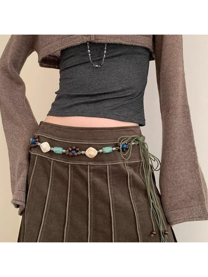 Close-up of Beco Boho beaded rope tie belt showing detailed beadwork and texture