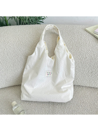 Side view of Cosbai Casual Micro Dot Hobo Bag showing curved shape and single shoulder strap