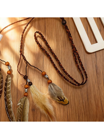Hairish boho simple feather hair headpiece laid flat with feathers spread