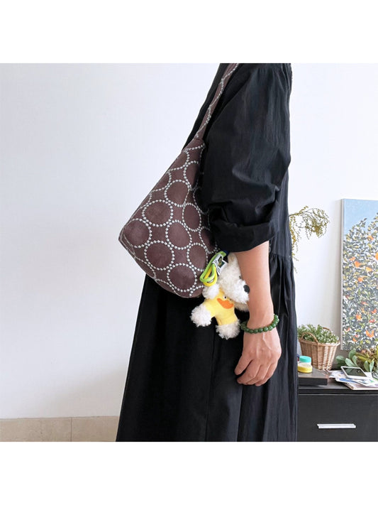 Cosbai soft textured slouch tote bag in beige on white background