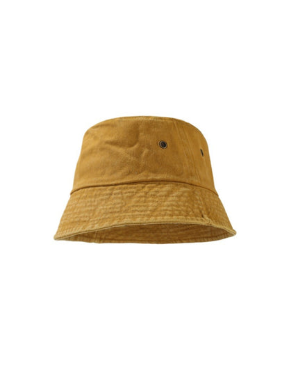 Model wearing Haila Everyday Washed Bucket Hat outdoors