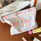 Cosbai Bow Floral Cosmetic Bag displayed standing upright