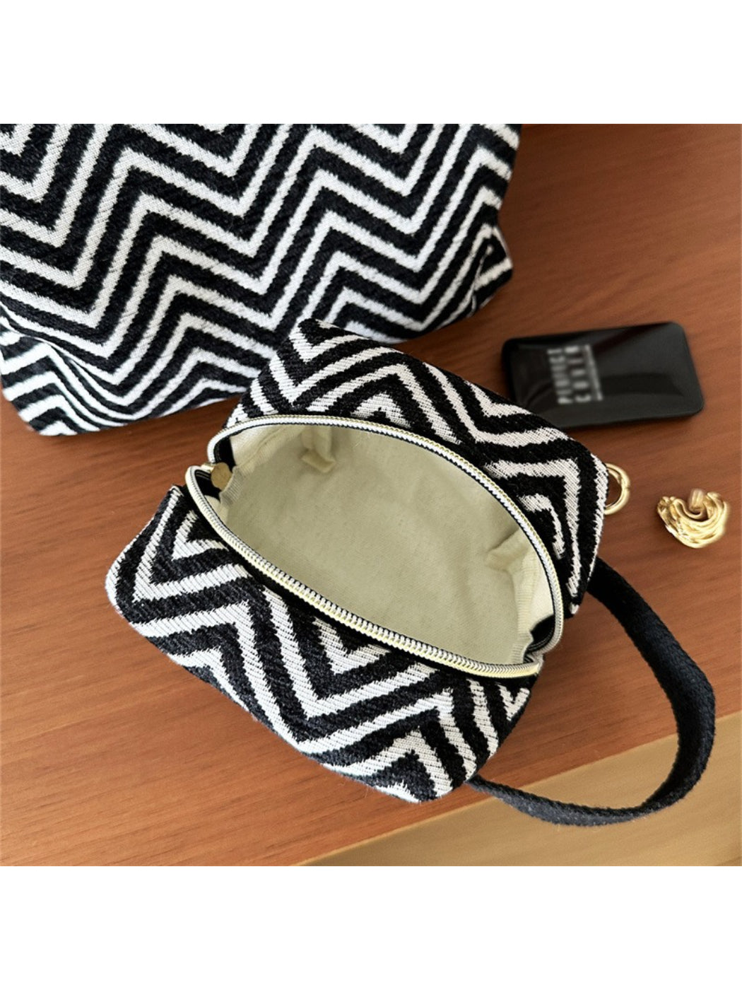 Cosbai Zigzag Print Zip Pouch partially open showing the pouch shape and zipper