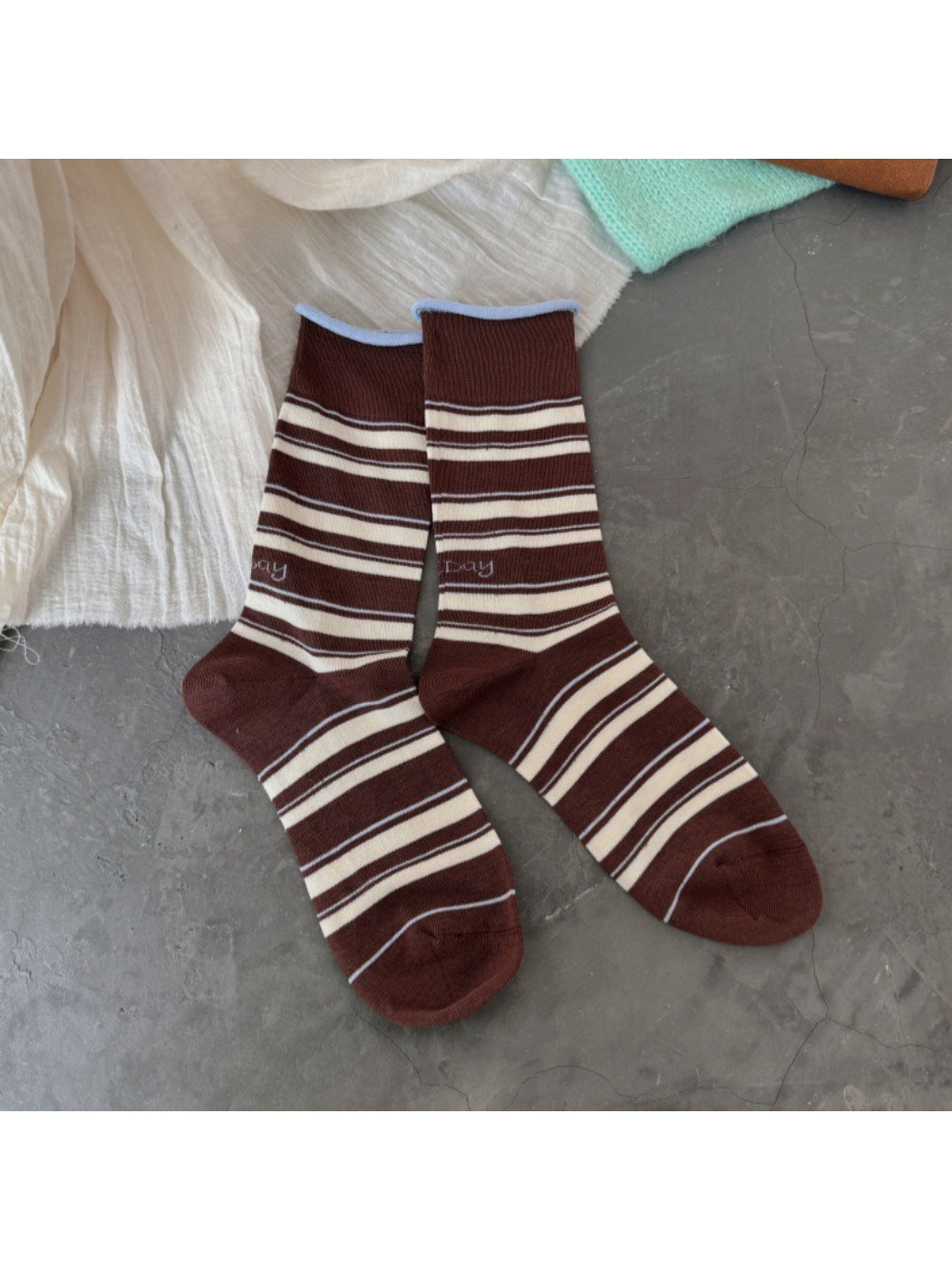 Model wearing Rufia Classic Fine Stripe Crew Socks with casual shoes