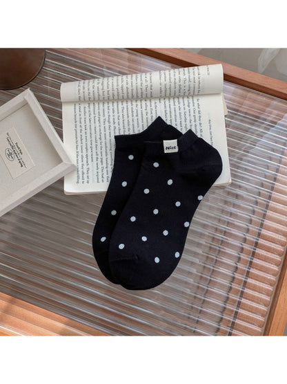 Rufia Everyday Polka Dot Socks displayed with packaging showing brand label