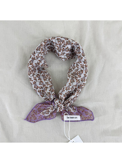 Scarvii Ditsy Floral Border Square Scarf folded showing floral border design on light background