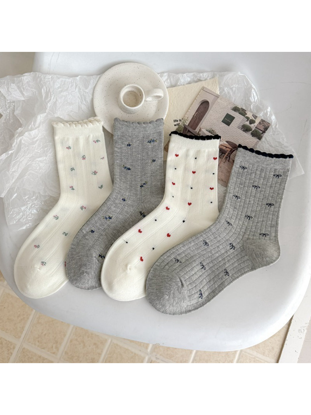 Close-up of Rufia crew socks lace trim and mixed pattern design