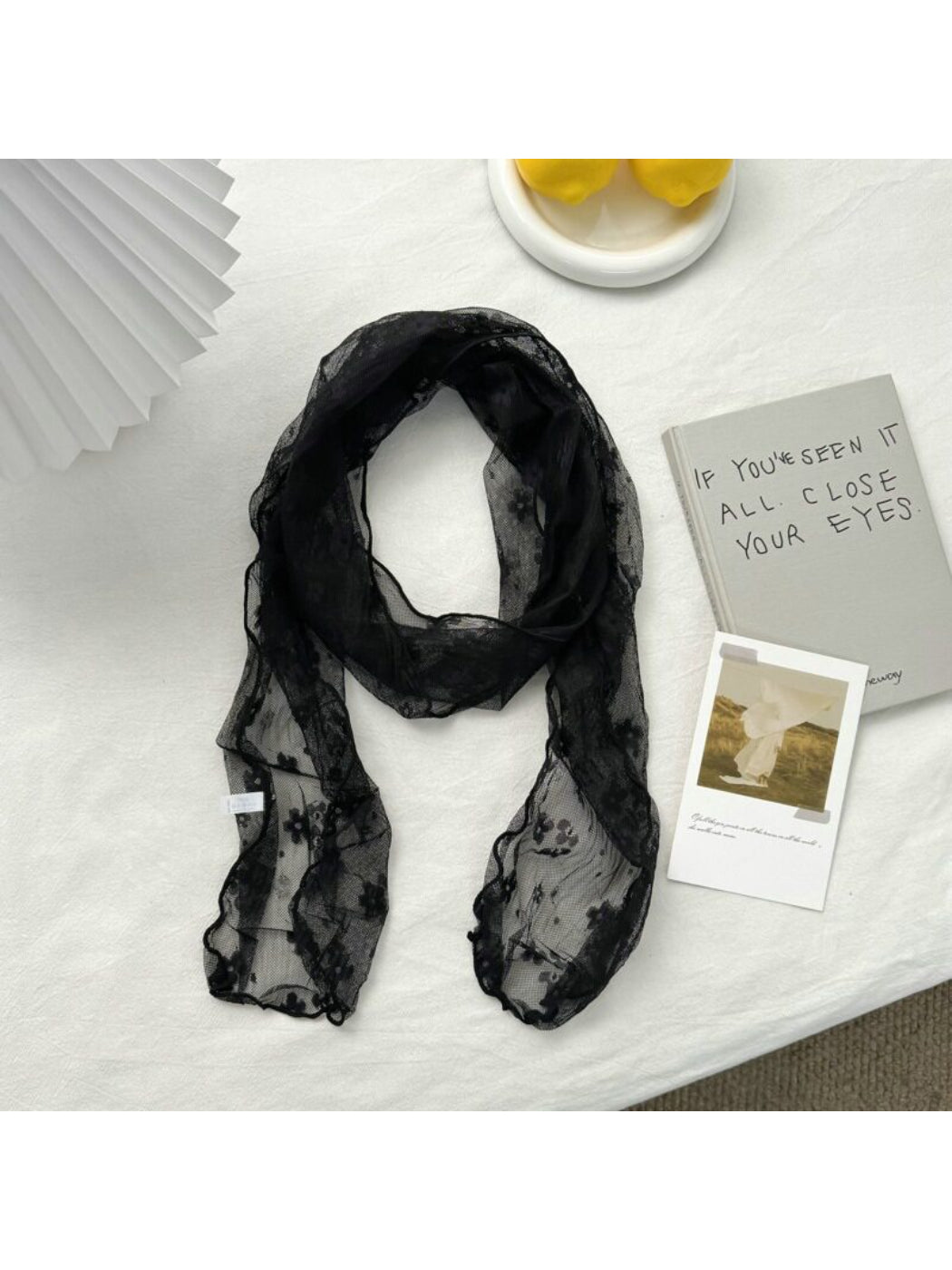 Soft Blossom Sheer Scarf folded neatly displaying translucent material and floral design