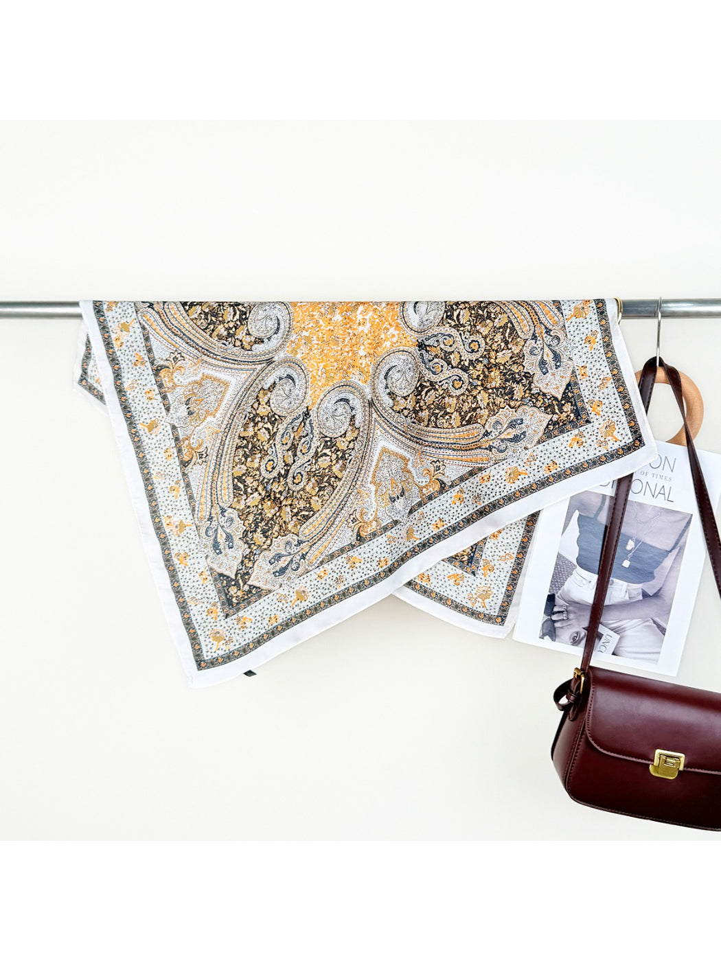 Scarvii Ornate Scroll Square Scarf folded diagonally showing border and scroll details