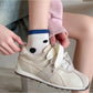Rufia Dot Color Block Low Cut Socks folded to show dot pattern and color blocks