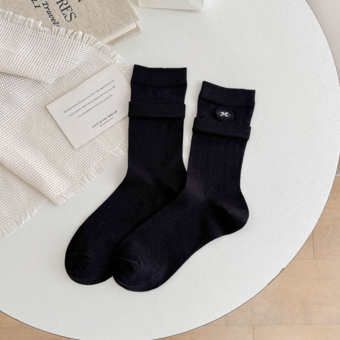 Model wearing Rufia soft turnover cuff ribbed socks with casual shoes