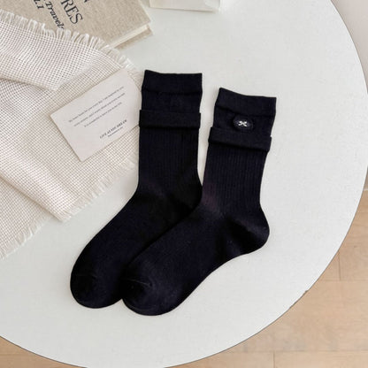 Model wearing Rufia soft turnover cuff ribbed socks with casual shoes