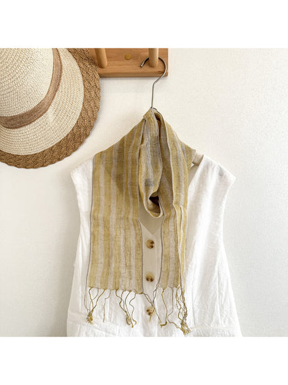Scarvii skinny scarf styled around neck with visible stripe trim