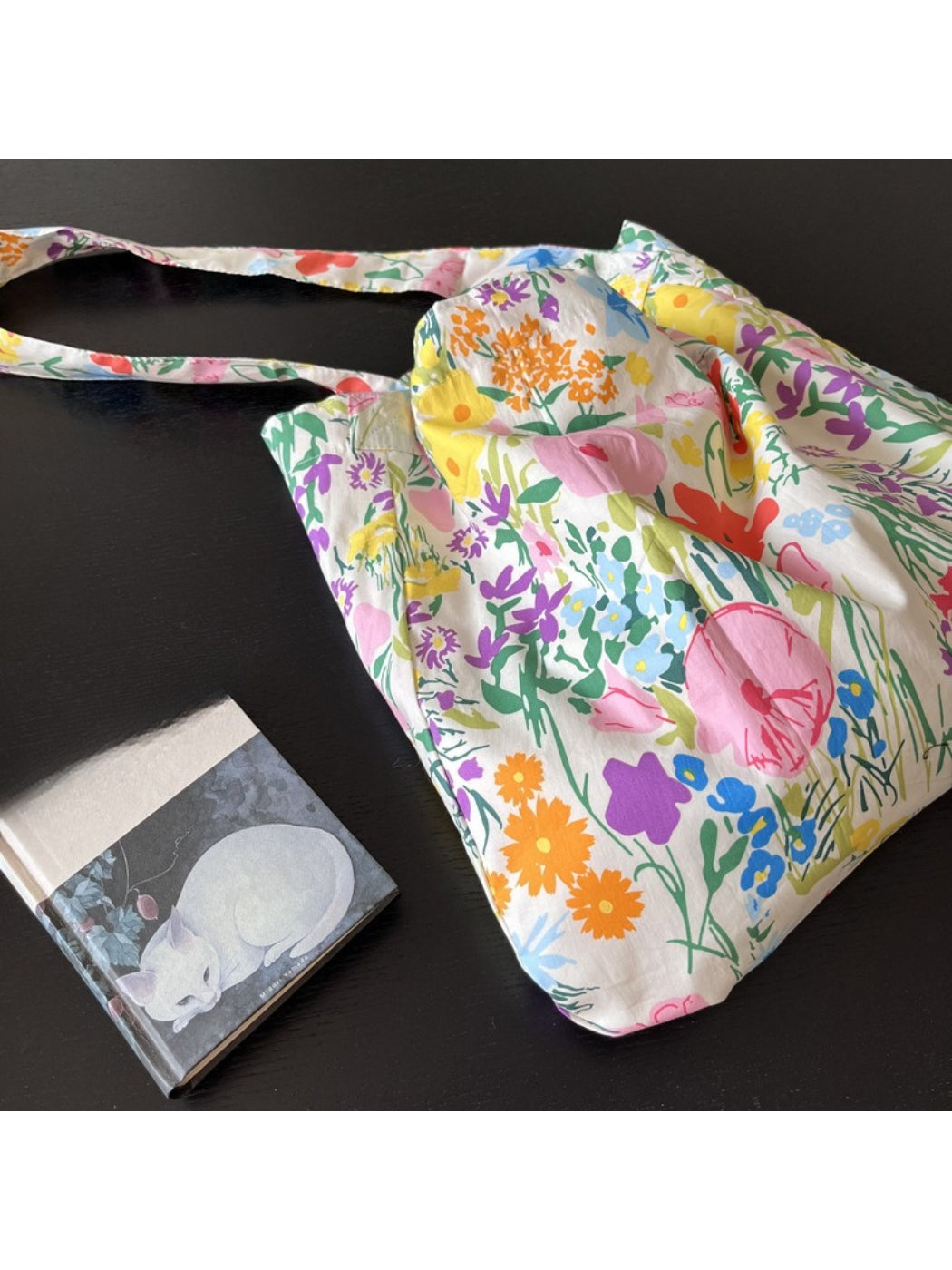 Close-up of floral fabric and stitching on Cosbai Meadow Bloom Slouch Tote Bag