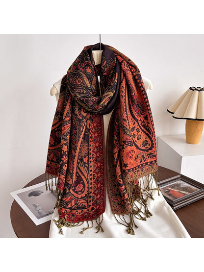 Scarf folded neatly with tassels visible on edges