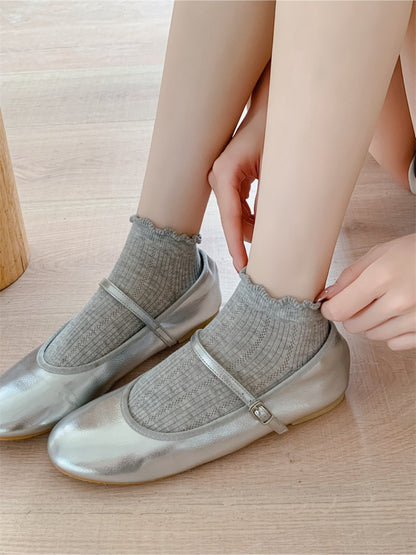 Rufia soft bobble trim ankle socks in pink displayed with packaging