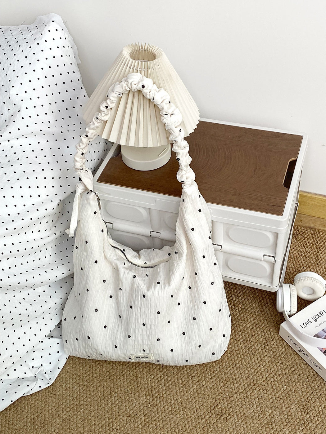 Cosbai slouchy shoulder bag with ruched strap displayed on white background