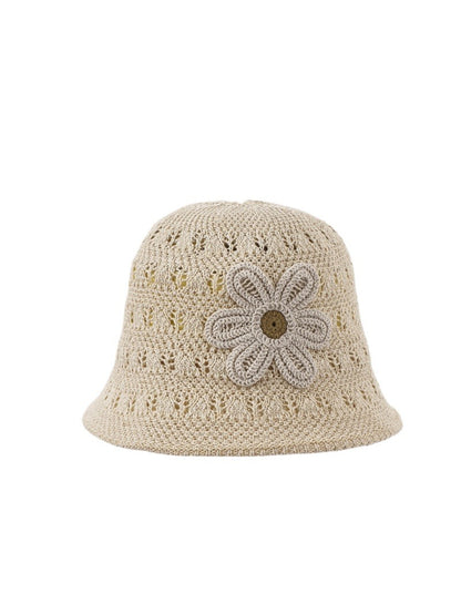 Side view of Haila open weave flower hat highlighting woven texture and flower detail