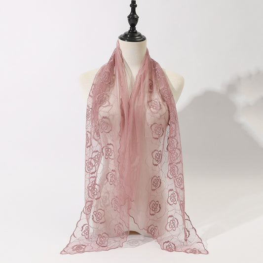 Close-up of floral sketch pattern on Scarvii tulle shawl scarf