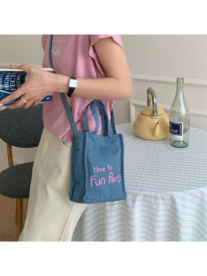 Side view of Cosbai mini slim tote crossbody bag showing slim profile and strap