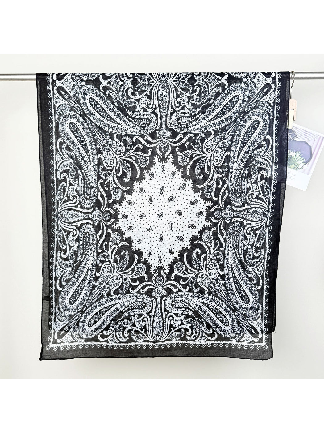 Scarvii Classic Paisley Neck Scarf styled as a headband on a model with loose hair