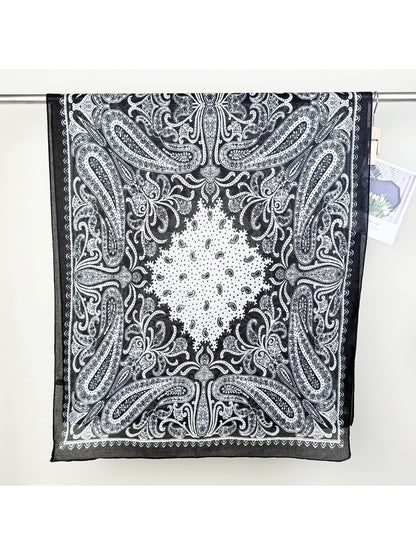 Scarvii Classic Paisley Neck Scarf styled as a headband on a model with loose hair