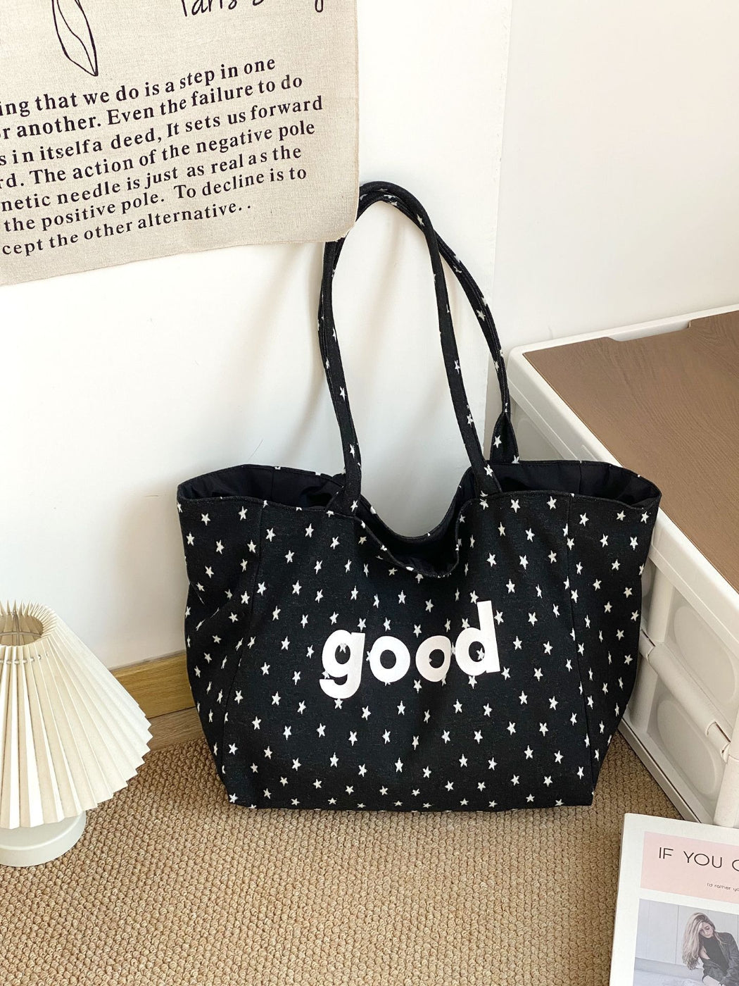 Cosbai tote bag with black star print on white canvas background
