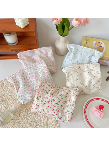 Cosbai Ditsy Floral Cosmetic Pouch with pink and white small flower print on fabric