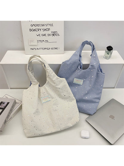 Cosbai everyday tote bag with star pattern shown from side angle