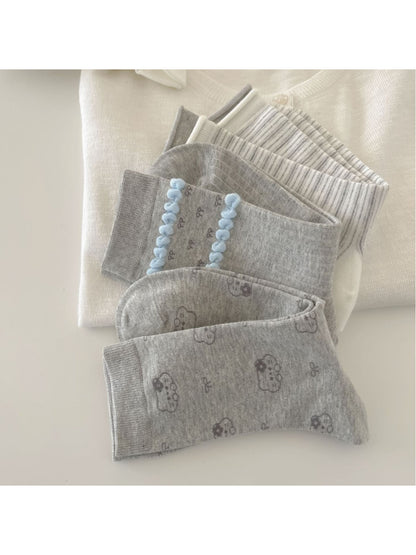 Close-up of Rufia Dreamy Blue Trim sock fabric texture and blue trim detail