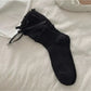 Rufia Ribbon Ruffle Crew Socks styled with casual footwear highlighting ruffle trim