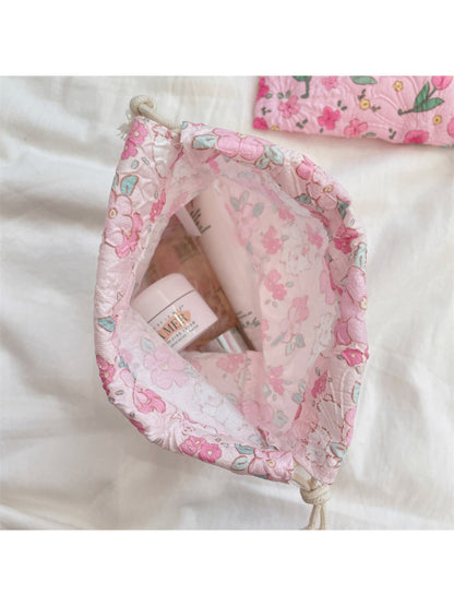 Cosbai cartoon drawstring pouch displayed upright with drawstrings hanging down