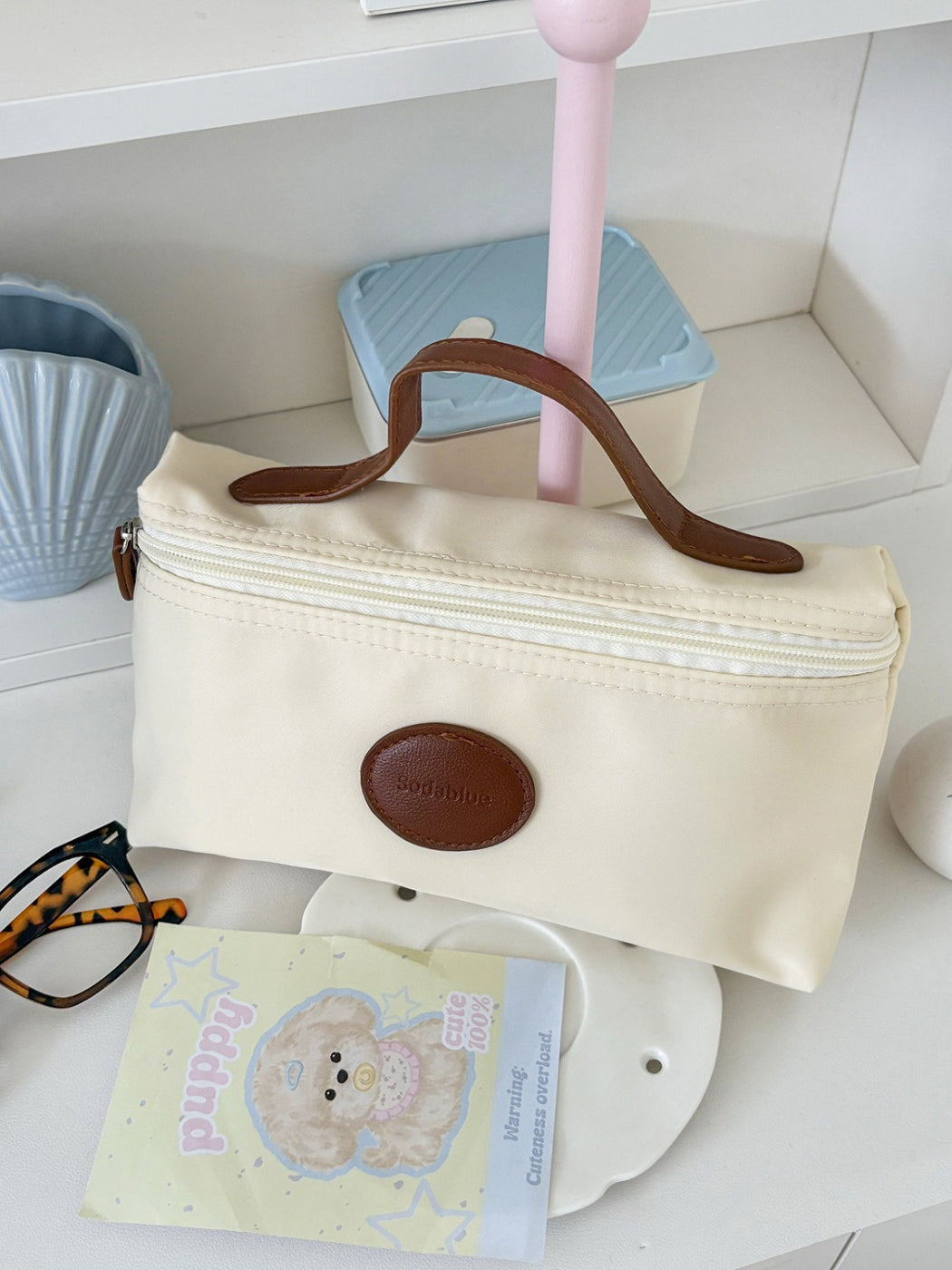 Cosbai beauty pouch standing upright on white surface