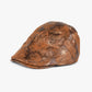 Haila gold foil vintage flat cap worn on a mannequin head