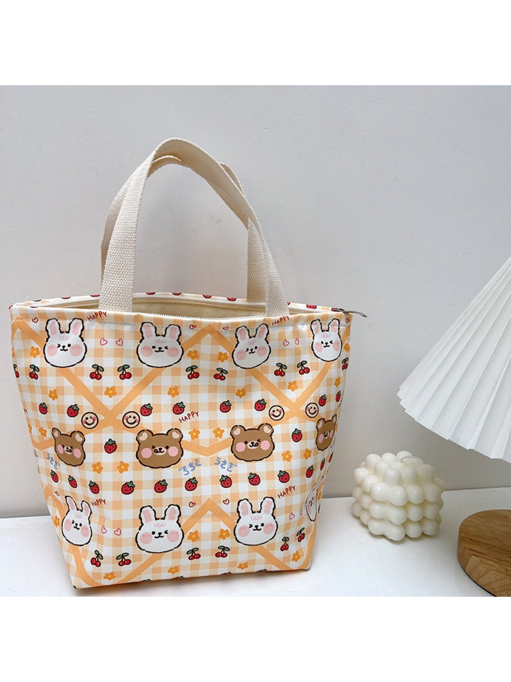 Cosbai lunch tote bag with animal print design held by hand