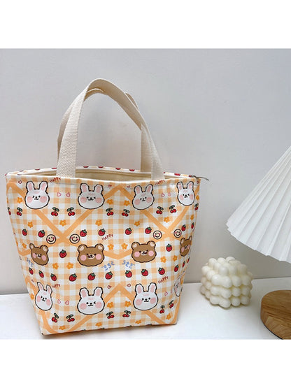 Cosbai lunch tote bag with animal print design held by hand