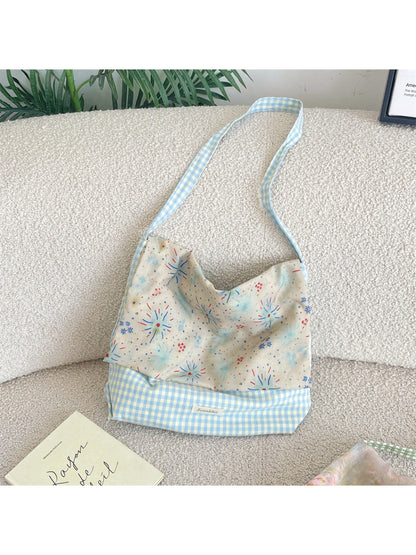 Close-up of gingham and floral patchwork pattern on Cosbai tote bag