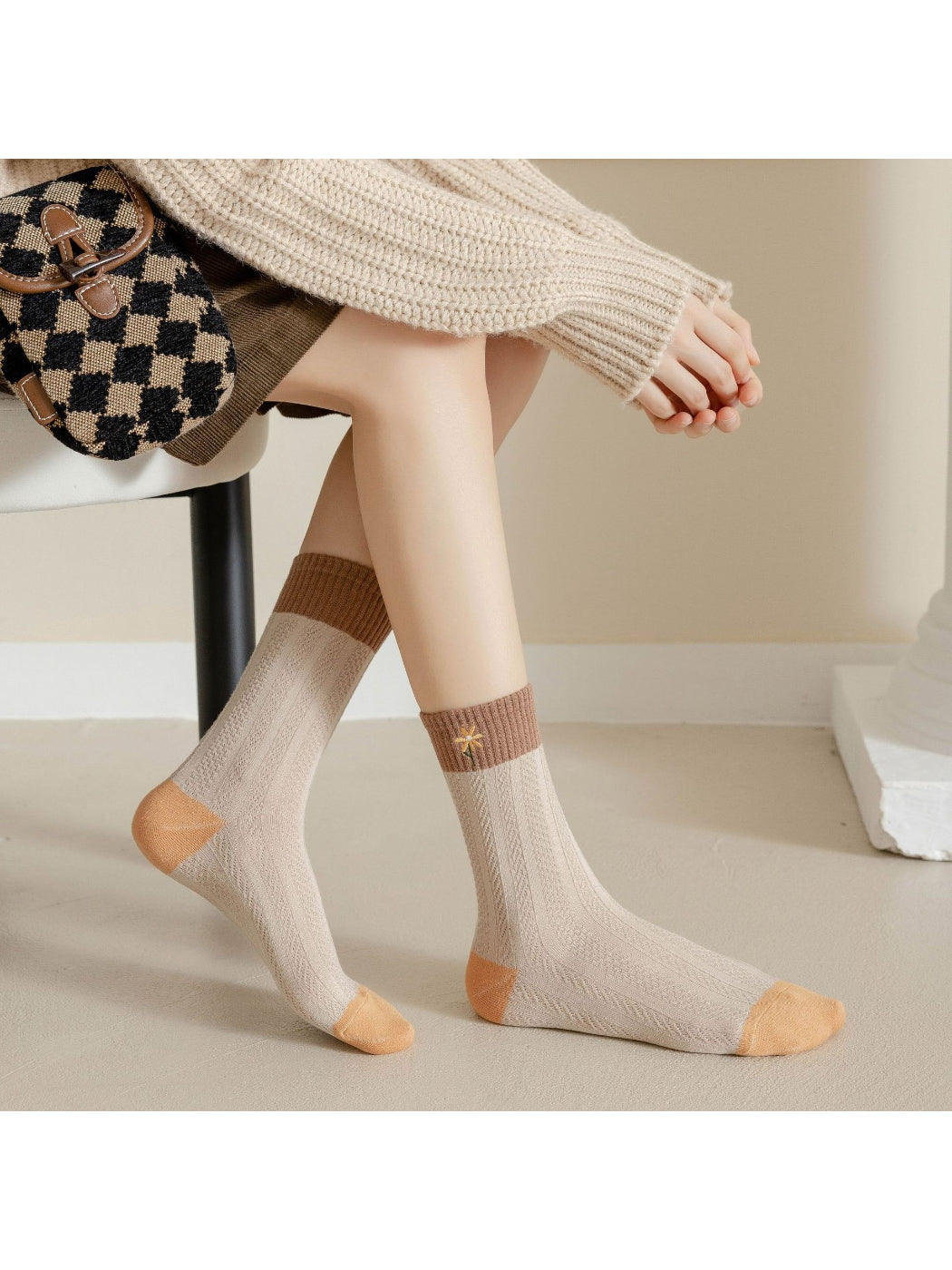 Rufia Woodland Bloom mixed crew socks displayed flat with colorful botanical prints