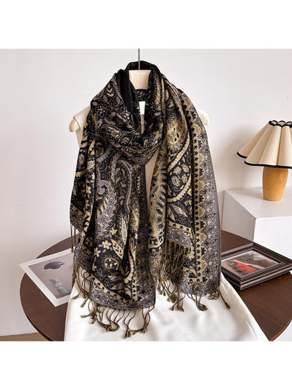Model wearing the bohemian paisley tassel wrap scarf draped over shoulders