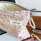 Cosbai Soft Rose Organizer Pouch angled view highlighting shape and color