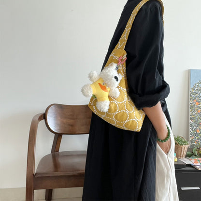 Side view of Cosbai Circle Stitch Shoulder Hobo Bag showing strap and stitching