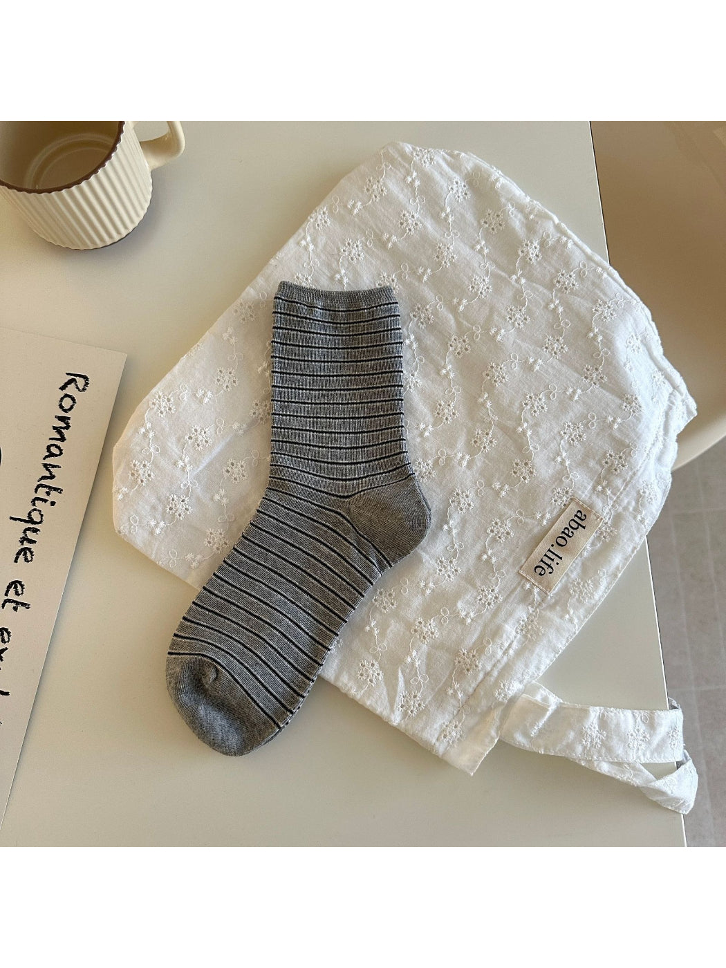Rufia Classic Thin Stripe Crew Socks stretched to show elasticity and stripe detail
