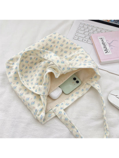 Cosbai small carry tote bag displayed on a flat surface with floral design