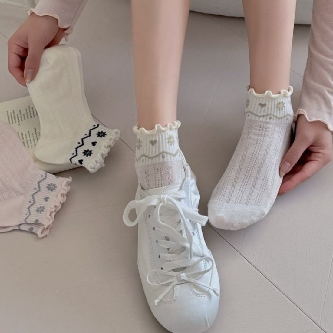 Rufia Nordic Heart Frill Crew Socks displayed flat highlighting frill edge and heart motifs